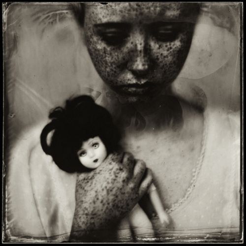 E. and Doll